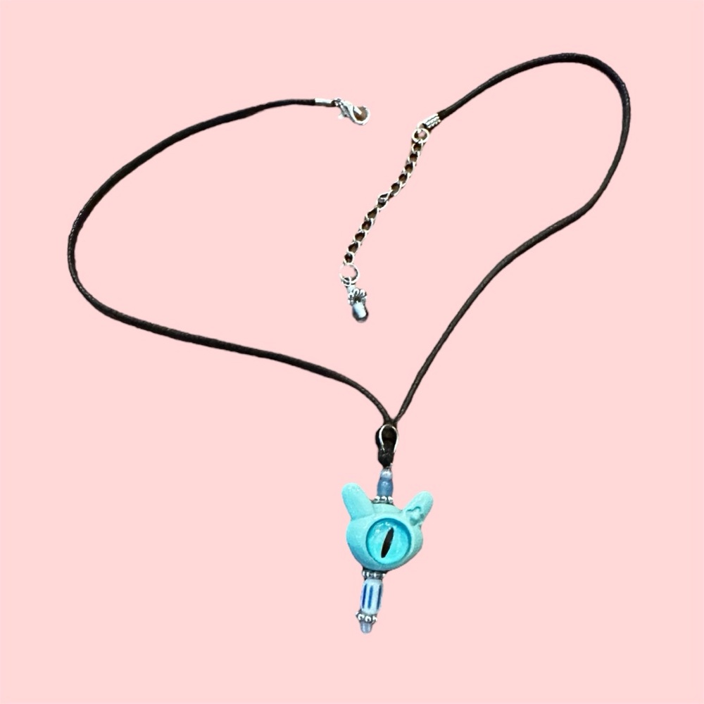 Handmade (not by me) boutique blue cat eye necklace